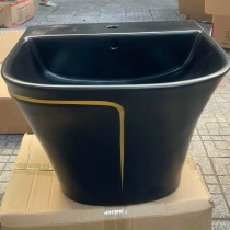 Lavabo cao cấp treo nguyên khối đen viền vàng