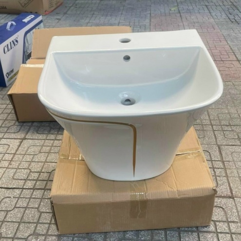 Lavabo cao cấp treo nguyên khối đen viền vàng